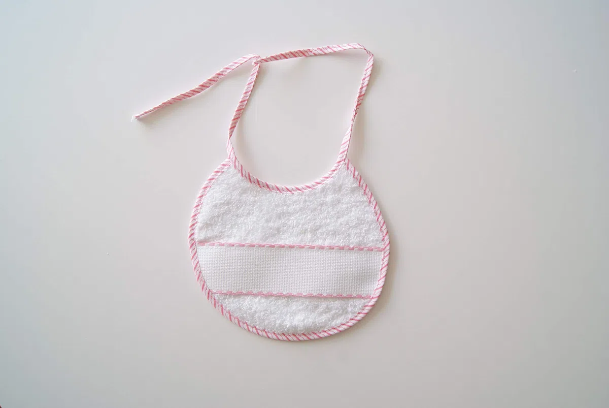 Interbaby 00040 - Pack de 12 baberos de punto de cruz 20x20, unisex