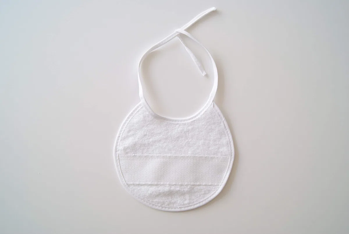 Interbaby 00040 - Pack de 12 baberos de punto de cruz 20x20, unisex